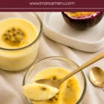 Creamy passion fruit desserts served in glass cups.