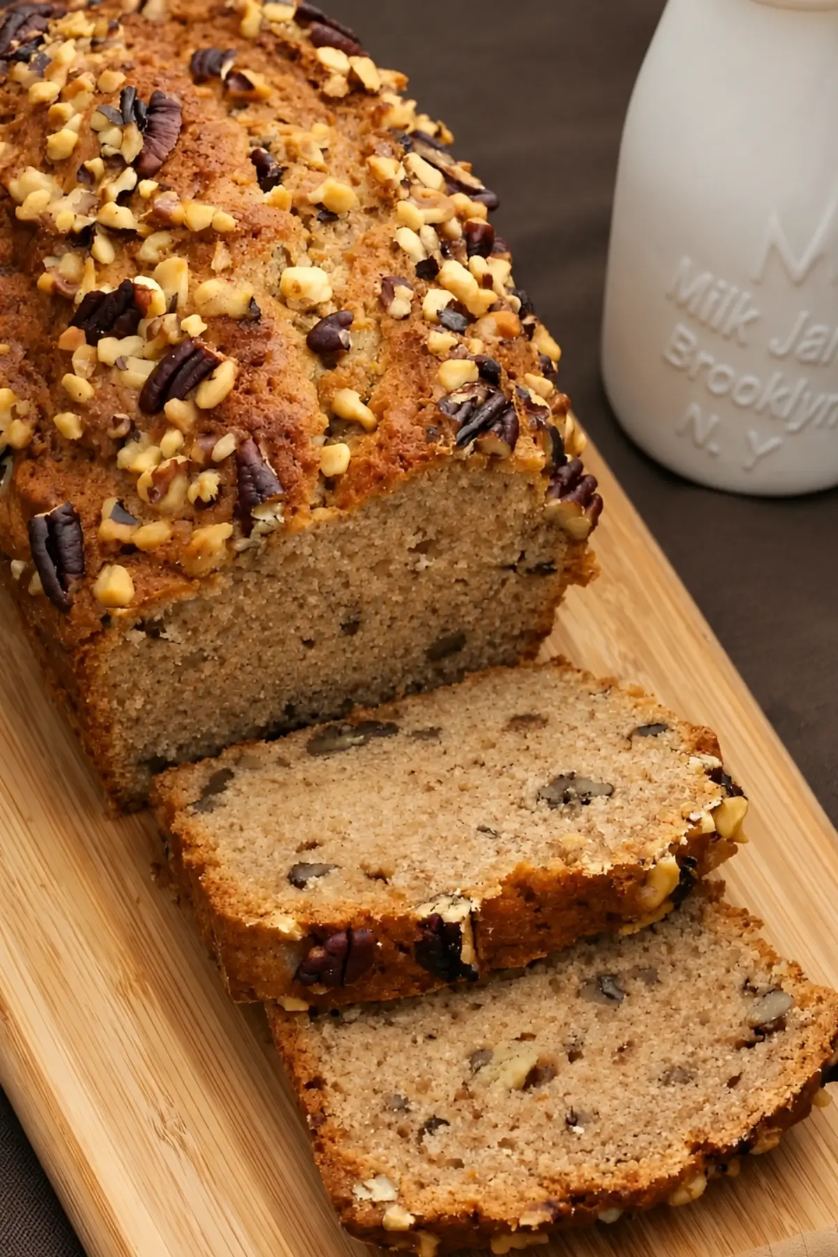 Banana loaf with chopped pecans and walnuts baked until golden brown.