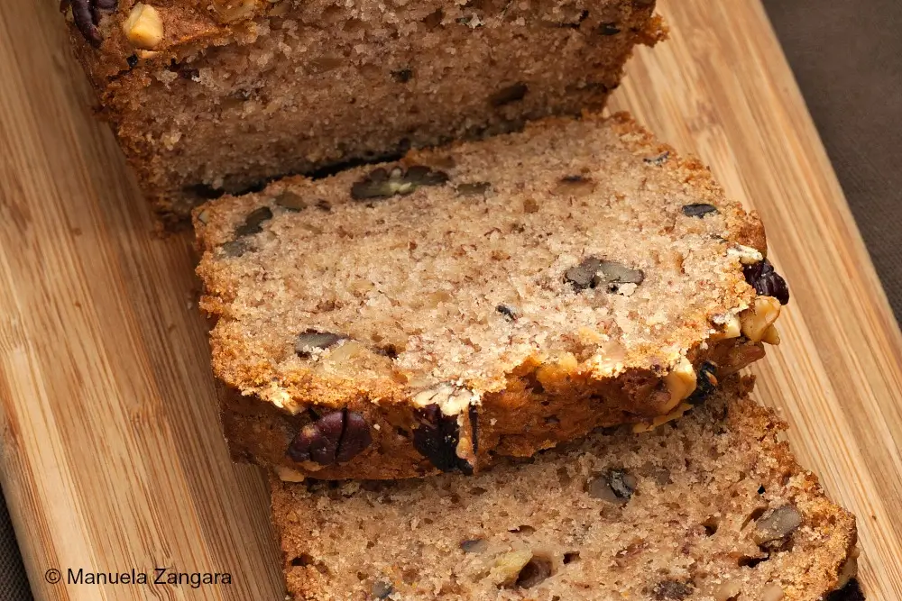 Close-up of sliced Copycat Starbucks Banana Nut Bread showing its soft crumb and nuts.