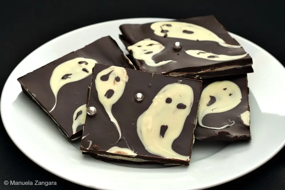 Pieces of Ghastly Bark on a white plate.