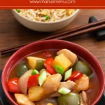 Sweet and Sour Chicken Stir Fry with pineapple, capsicums and sliced scallions, served beside fried rice.