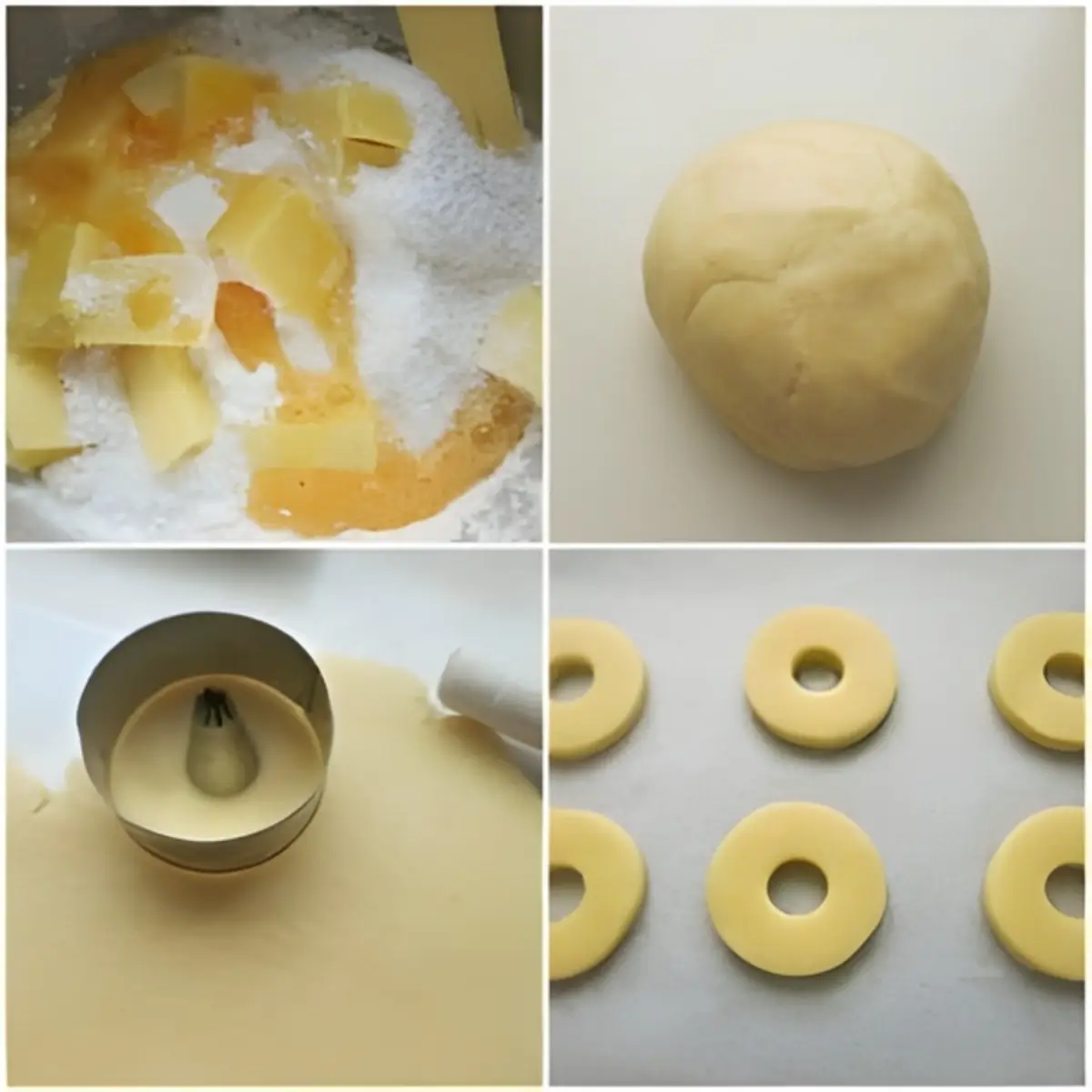 Ingredients mixed for macine cookies, dough rolled out, and cut into ring shapes before baking.