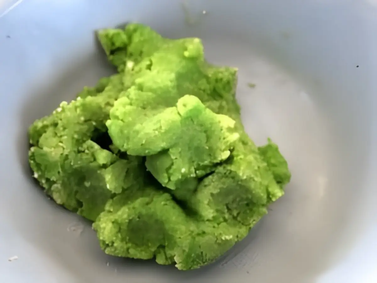 Green marzipan dough after colouring and kneading.