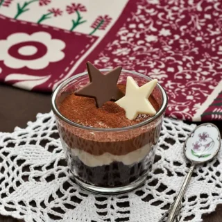 Three layers of silky chocolate mousse come together in this Triple Chocolate Mousse dessert with dark, milk, and white chocolate for a rich, make-ahead treat.