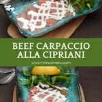 Thin slices of raw beef arranged on a blue plate with Cipriani sauce, rocket, and a lemon wedge.