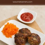 Rissoles served with grated carrot and tomato ketchup.