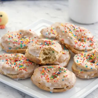 Top view of Easter Taralli arranged on a serving plate with sprinkles.