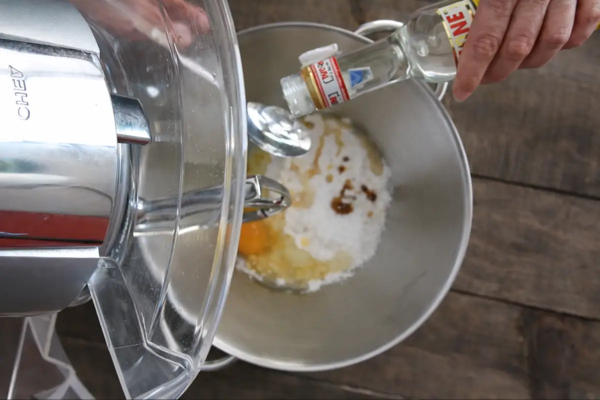 Ingredients combined in a mixer to prepare Italian Easter cookies dough.