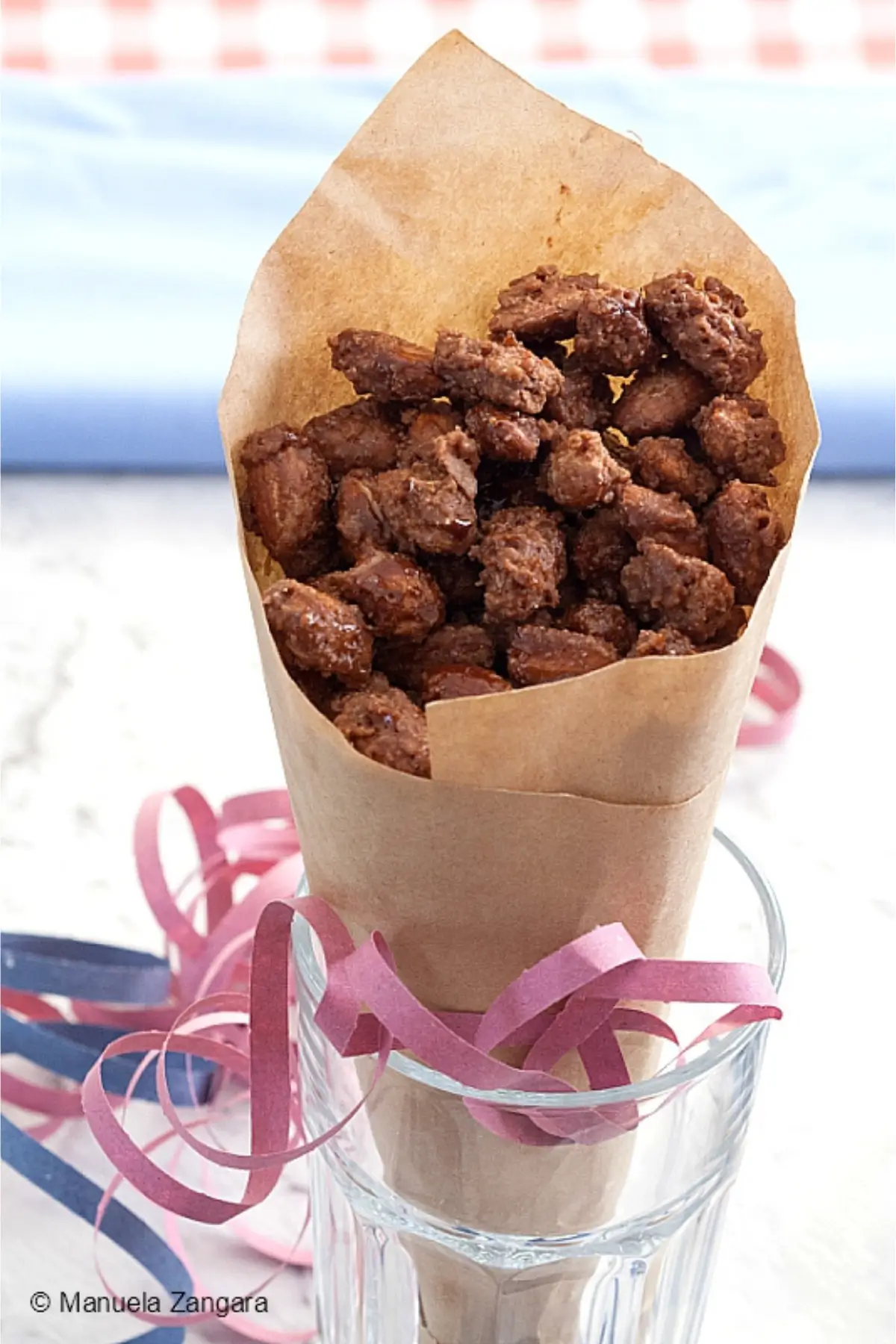 Paper cone filled with homemade almond pralines.