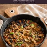 One-Pot Mediterranean Eggplant Rice served in a cast-iron skillet.