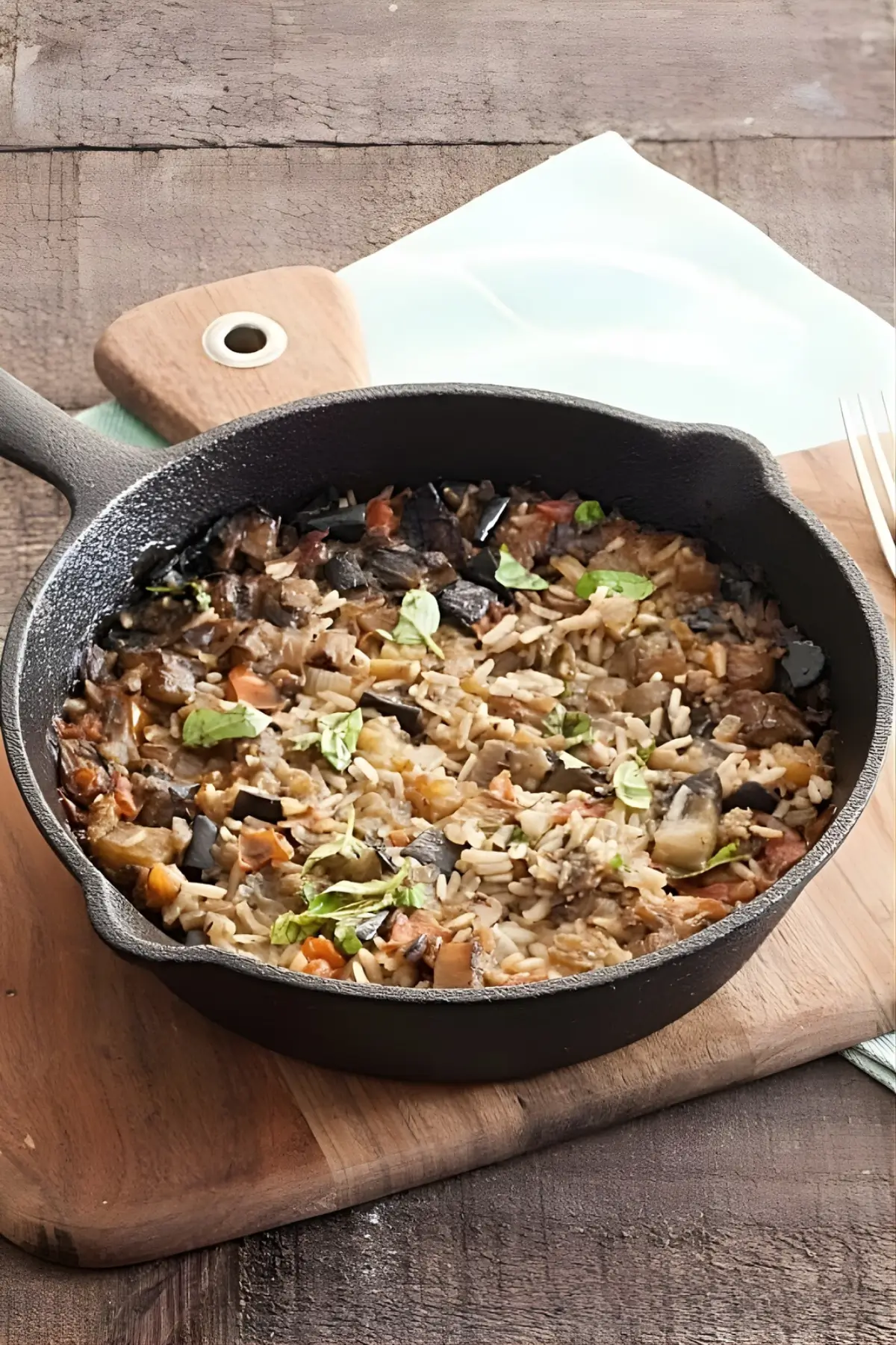 Freshly baked eggplant rice in the skillet.