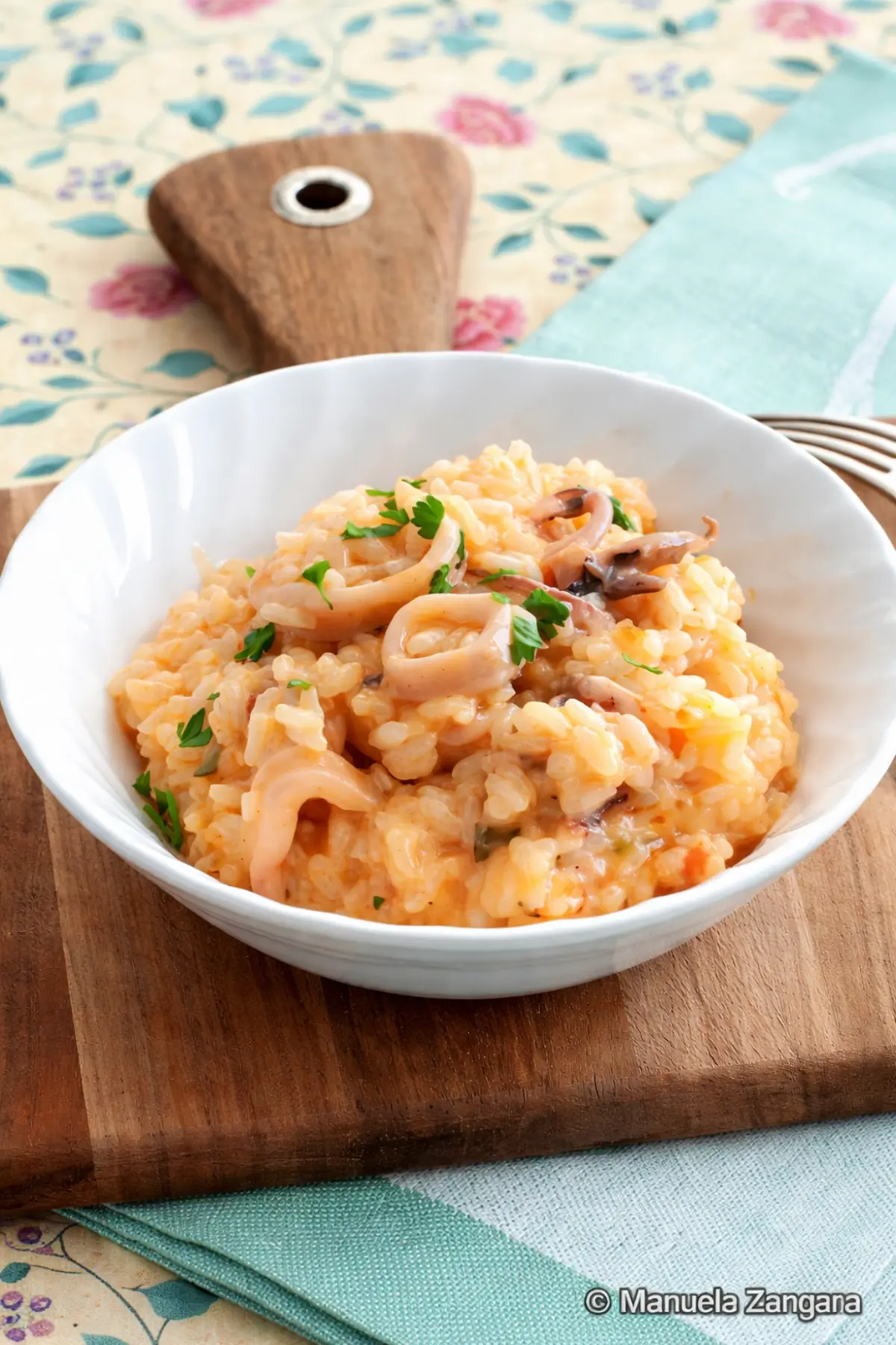 Low FODMAP Calamari Risotto served in a bowl.