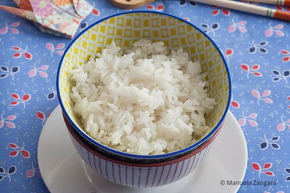 Bowl of perfectly cooked long grain rice served.