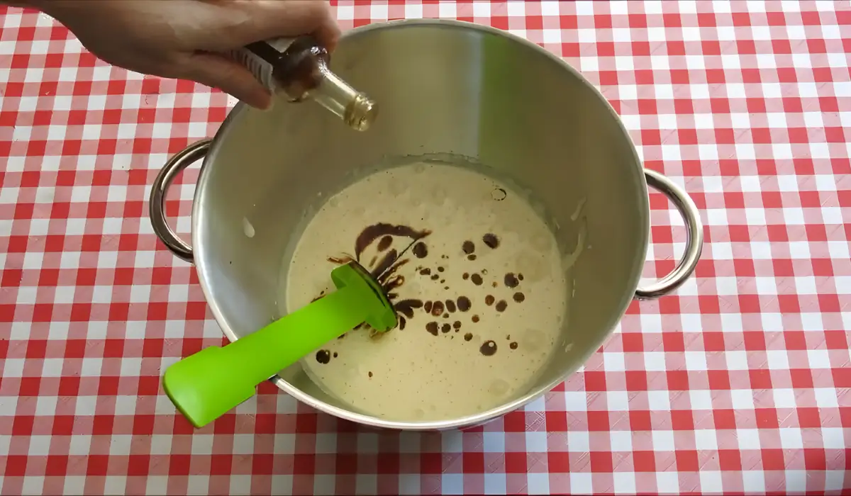Vanilla extract added to the egg and sugar mixture before folding in the melted chocolate.