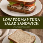 Low FODMAP Tuna Salad Sandwich served on a white plate with lettuce and tomato.