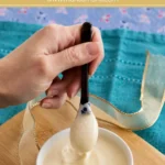 Homemade mustard mayo served in a small bowl beside Dijon mustard.