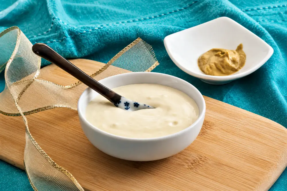 Thick and creamy mustard mayo in a bowl.