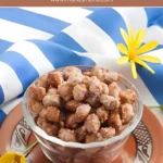 Sweet caramelised peanuts in a glass bowl with yellow flowers in the background