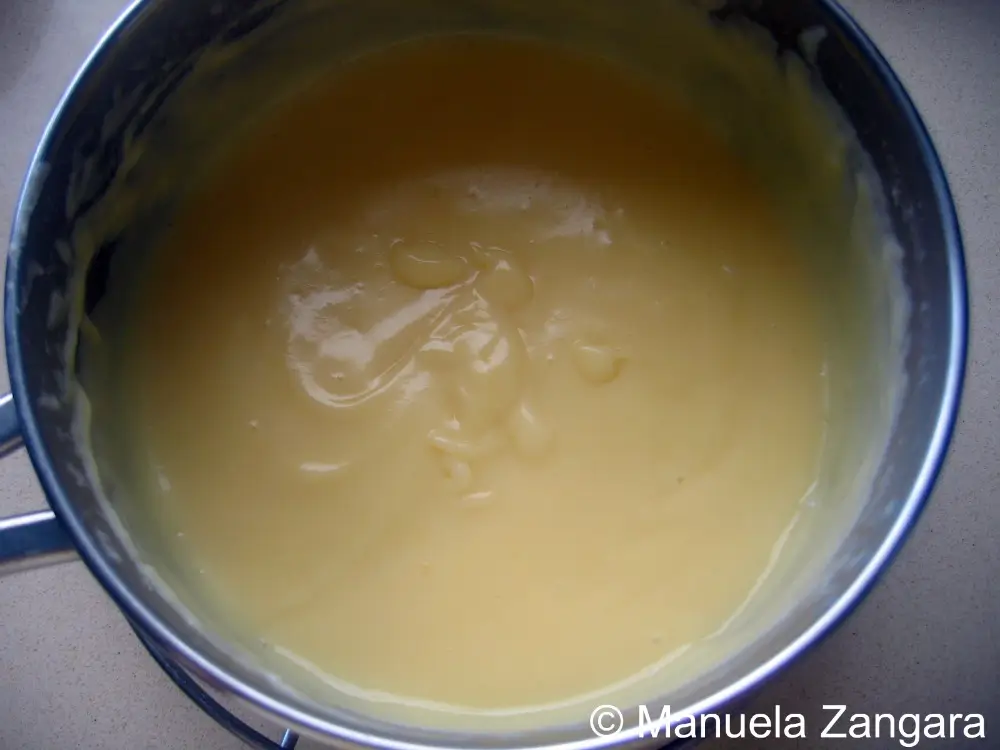 Finished Creme Patissiere in the pot with a smooth custard texture.