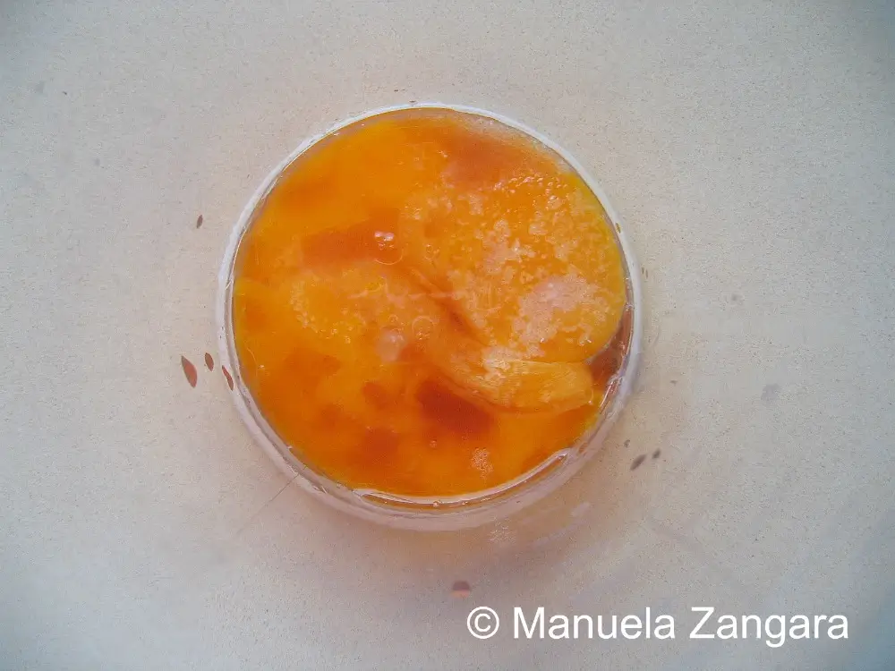 Bowl with egg yolks, salt, and vinegar before whisking.