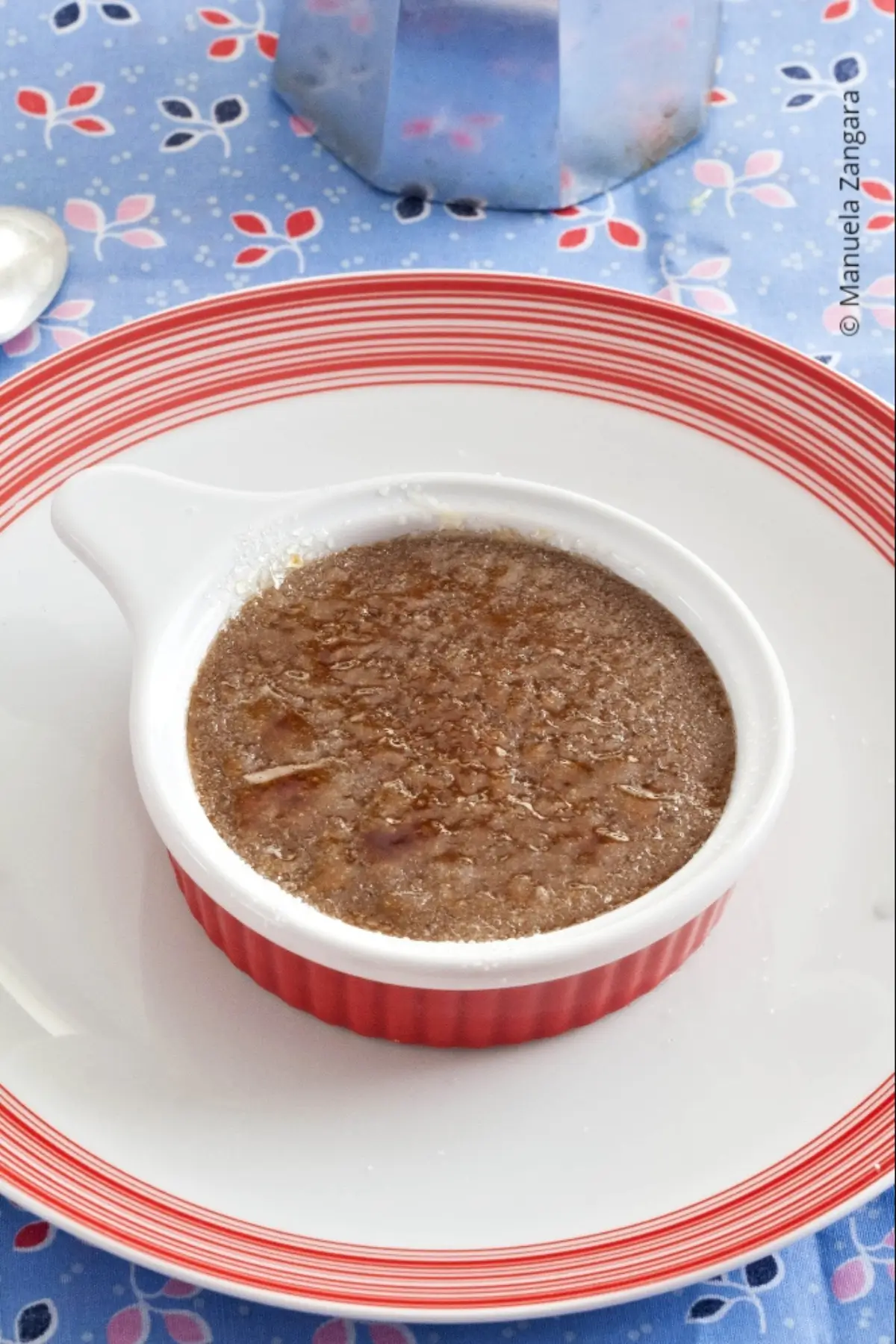 Coffee Crema Catalana with a crisp caramelised sugar topping in a white ramekin.