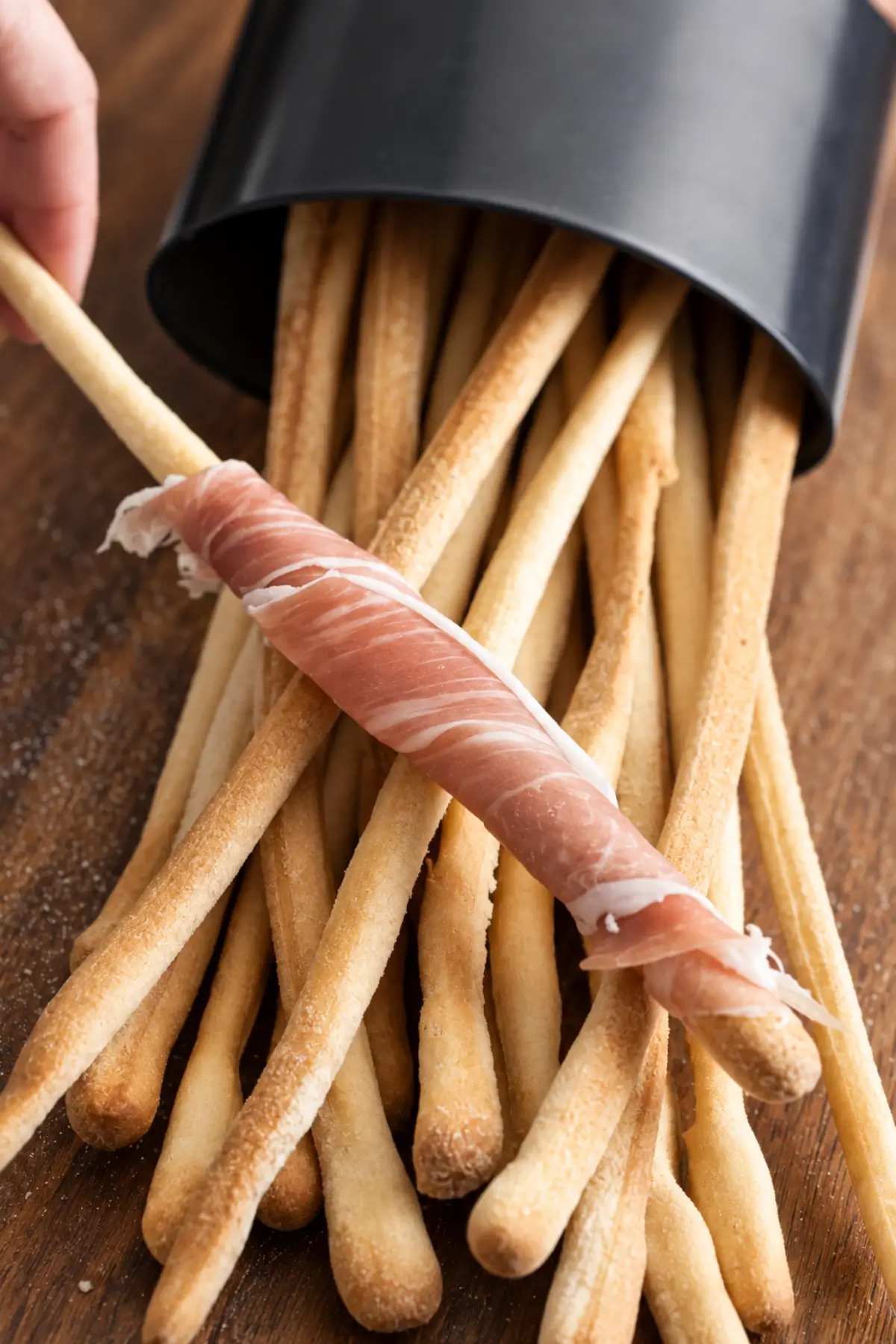 Crisp Italian breadstick wrapped with Prosciutto over freshly baked grissini.