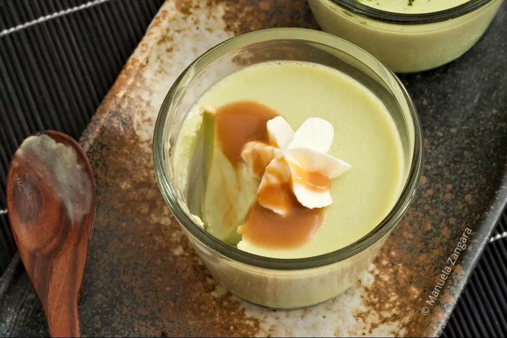 Finished matcha panna cotta topped with whipped cream and miso caramel.