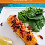 Maple and Sriracha Salmon with Bacon Crumbs served with crispy topping and lemon on the side.