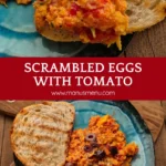 Creamy eggs and tomato sauce served with a slice of crusty bread.